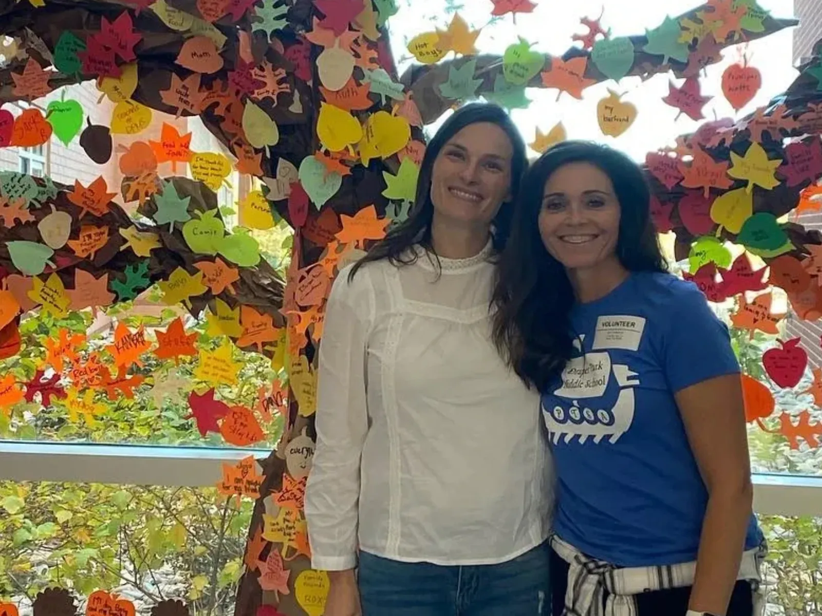 Erin Longacre, left, with a PTSA volunteer at Draper Park Middle School